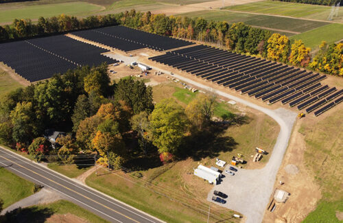 Distributed energy infrastructure installs community solar projects amid heavy snow