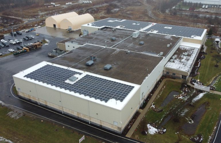 Ohio rubber manufacturing plant installs solar panels on flat roofs